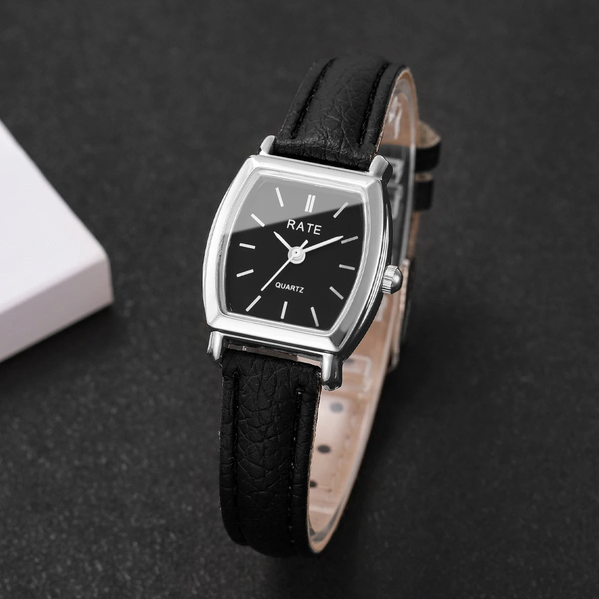 Elegant small watche with a leather strap