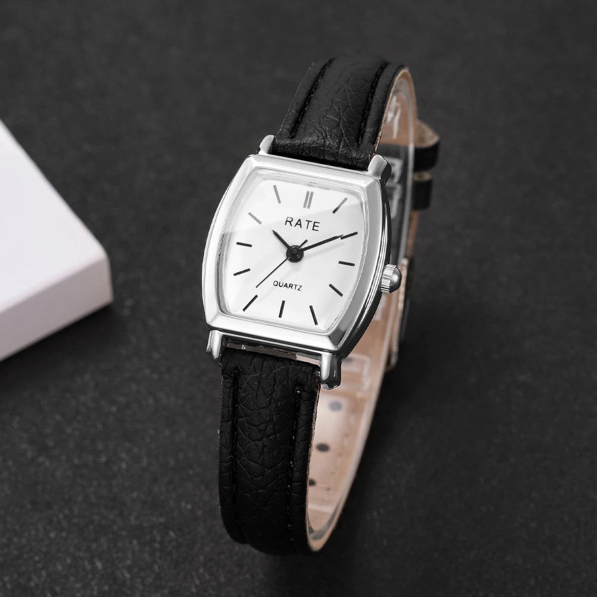 Elegant small watche with a leather strap