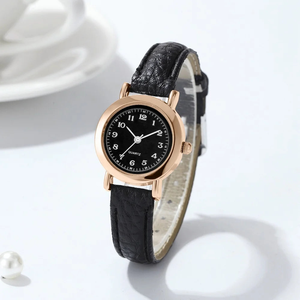 Elegant small watche with a leather strap
