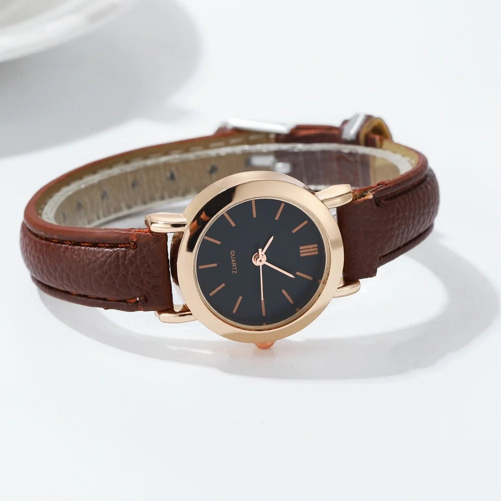 Elegant small watche with a leather strap