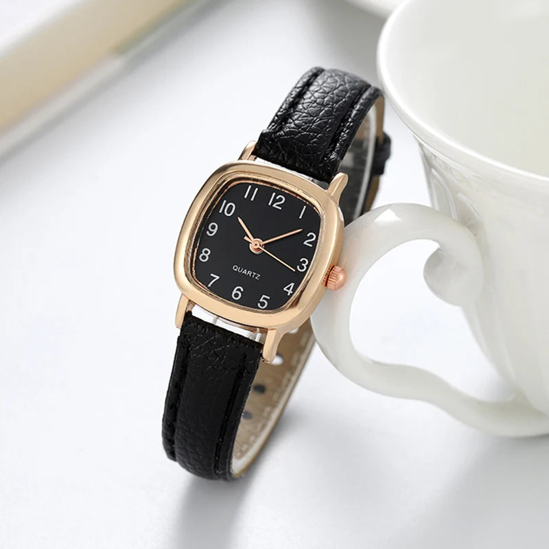Elegant small watche with a leather strap