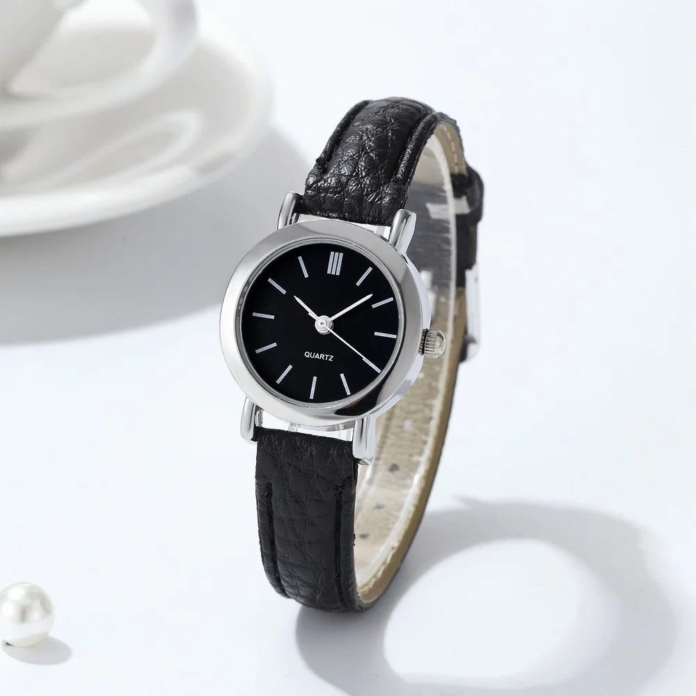 Elegant small watche with a leather strap