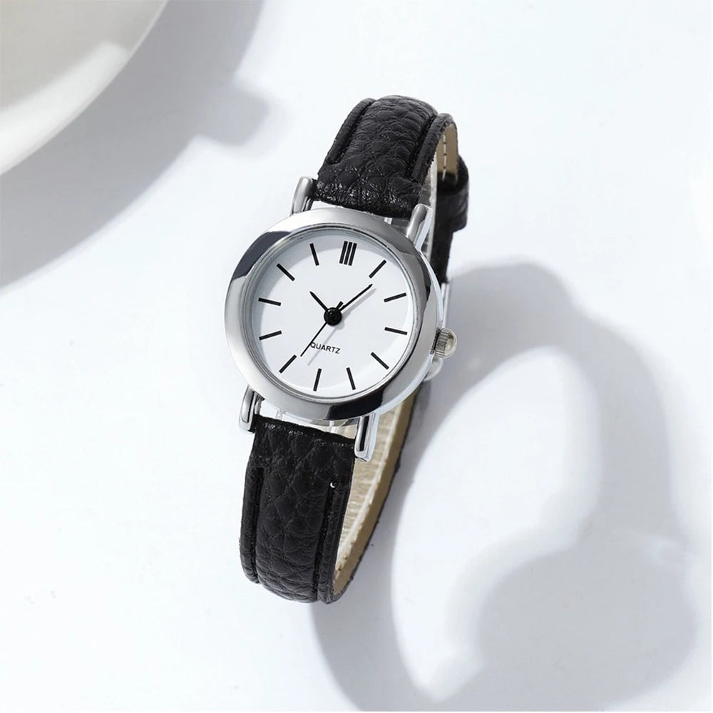 Elegant small watche with a leather strap