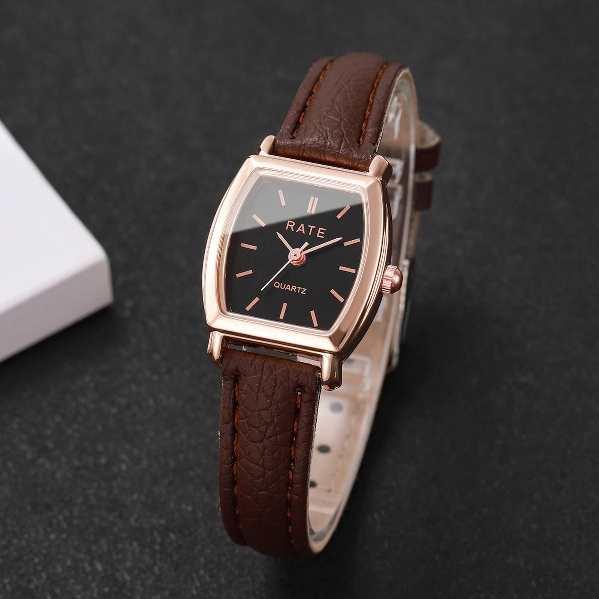 Elegant small watche with a leather strap