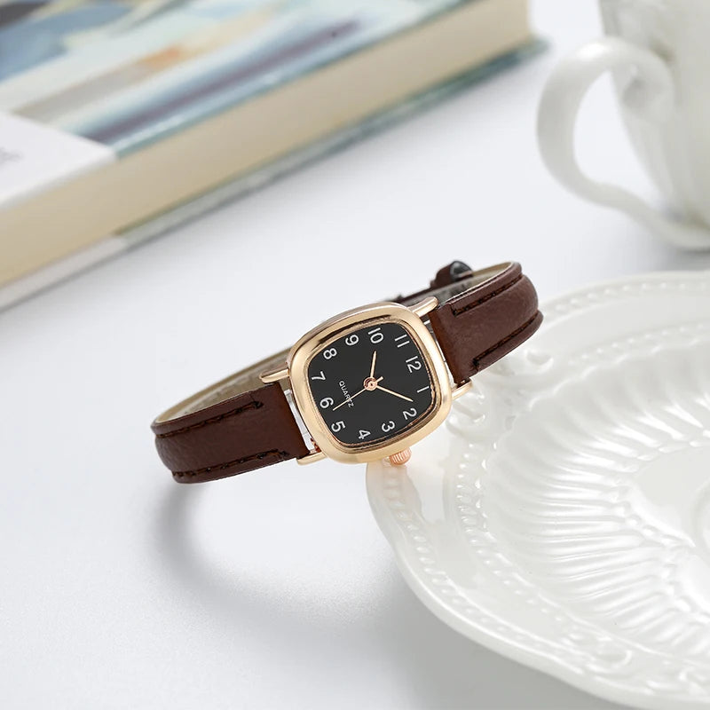 Elegant small watche with a leather strap