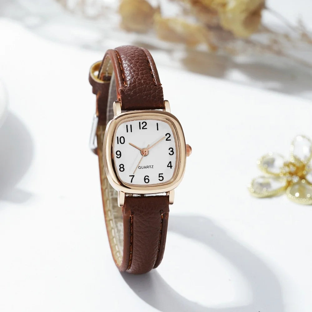 Elegant small watche with a leather strap