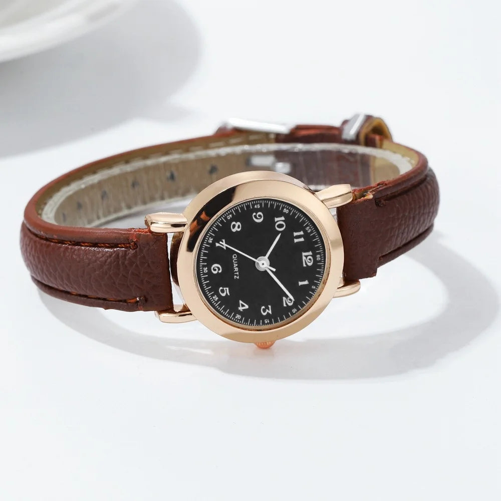 Elegant small watche with a leather strap