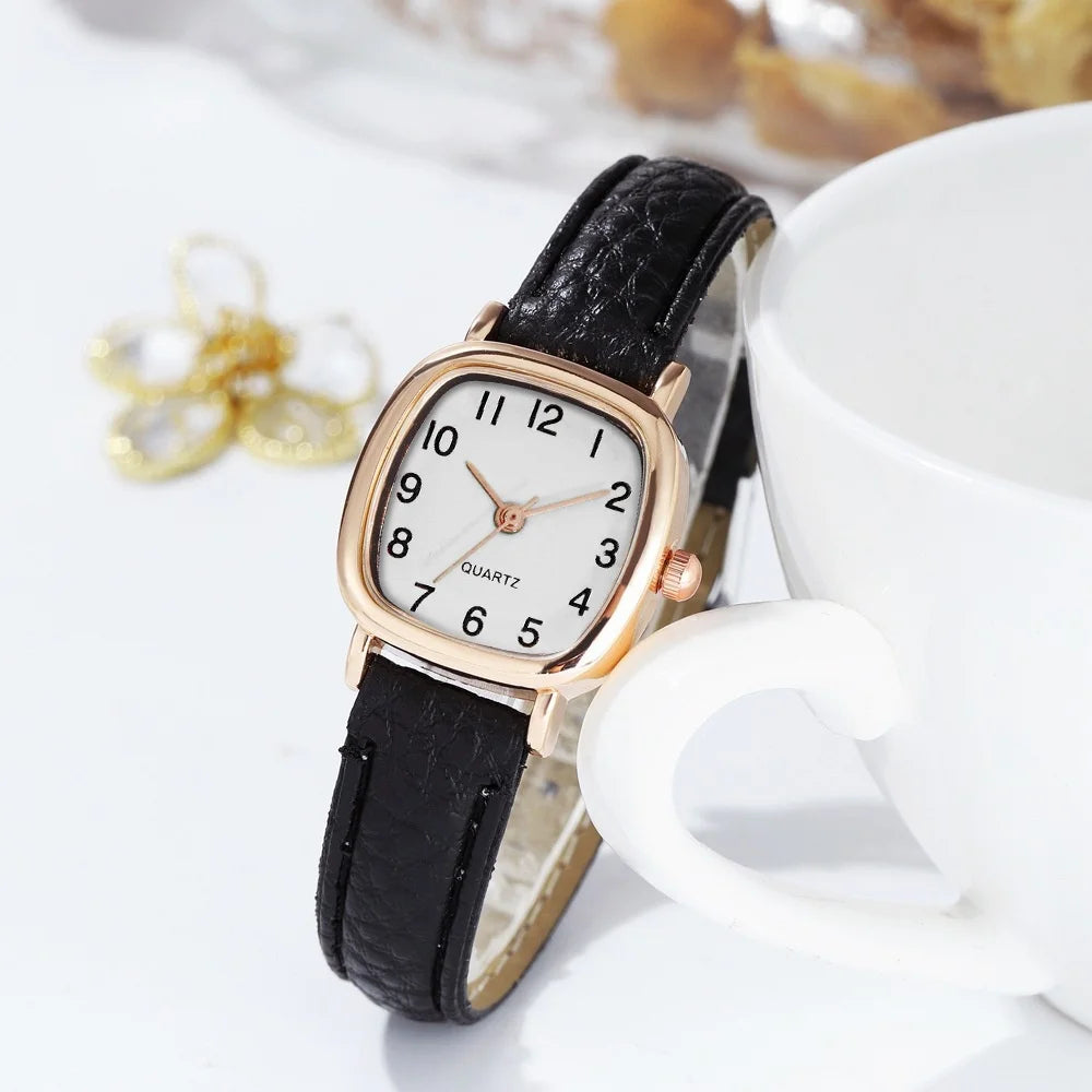 Elegant small watche with a leather strap